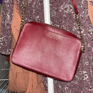 Michael Kors maroon crossbody purse. Good condition.